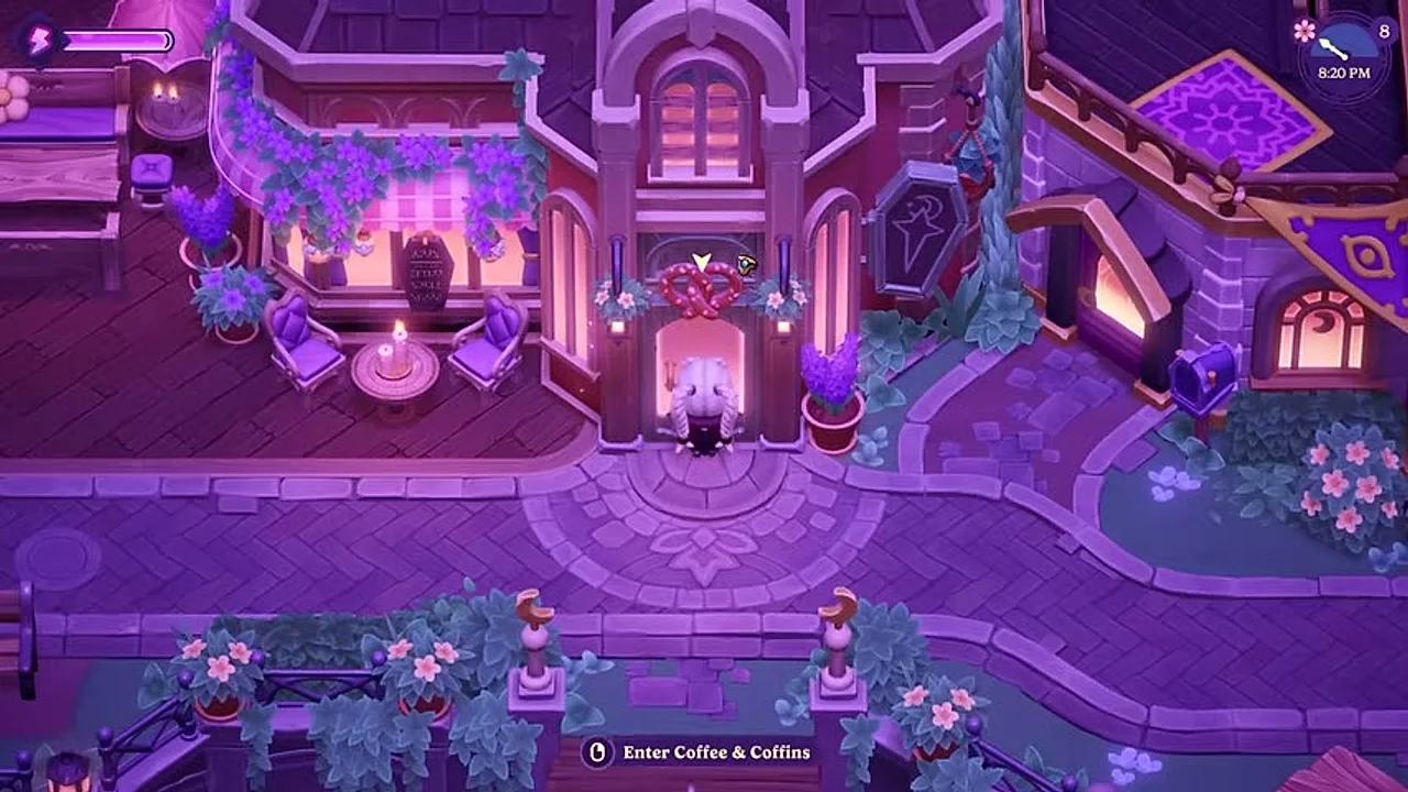 The entrance to Coffee & Coffins in the Moonlight Peaks Town Center at night.
